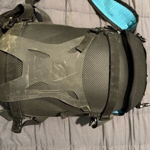 Sleek Black Backpack with Vibrant Blue Interior